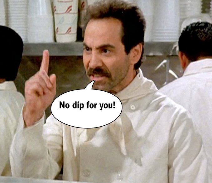 A scene from the film "The Soup Nazi" shows a chef in a white uniform wagging his finger sternly, with a speech bubble reading "No dip for you!"—humorously appropriated by the post to mock Bitcoin enthusiasts waiting in vain for a price dip.