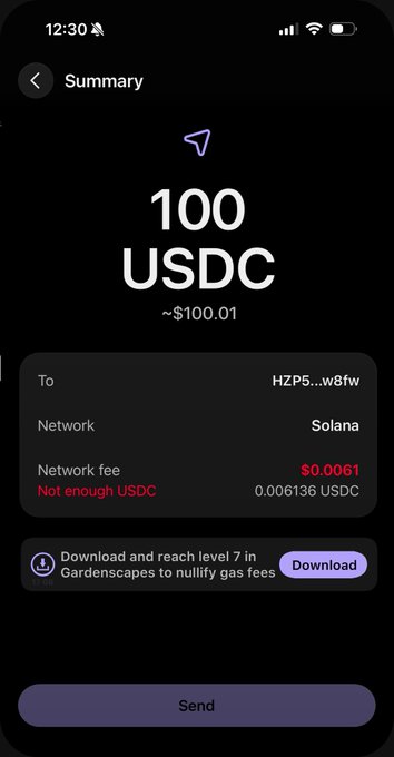 The image shows a cell phone screen displaying a message from a cryptocurrency wallet, asking for users to download and play a game to cover a $0.0061 gas fee. The wallet's address is "solana" and the current balance is 100 USDC.