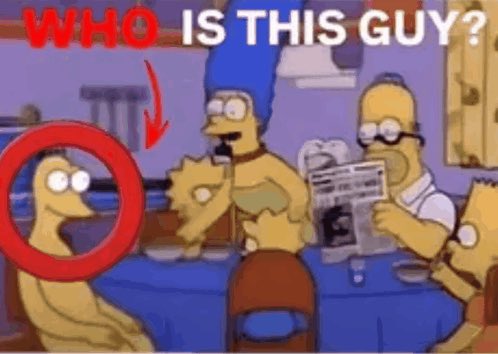 The image shows a scene from The Simpsons with the Simpsons family at the dinner table, with a red circle and arrow pointing to an unnamed background character, accompanied by the text "WHO IS THIS GUY?" The meme humorously relates to the post "minute accurate top" by highlighting how the main characters become so focused on a topic (like the "minute accurate top") that they completely overlook or are distracted from the obvious, just as viewers are distracted by Marge's hair while ignoring a strange background character.
