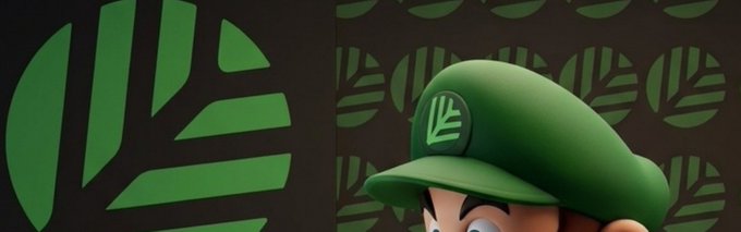 A close-up of a cartoon character wearing a green Luigi-style cap, set against a background featuring a green leaf-like logo pattern.