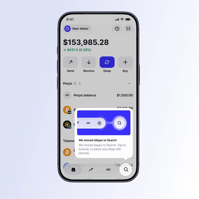 A smartphone displays a crypto wallet app showing a "Main Wallet" balance of $153,985.28, with a pop-up notification explaining "We moved dApps to Search" and instructing users to "Tap to browse, or paste any dApp URL directly," illustrating the new consolidated search feature for both dApps and contract addresses.