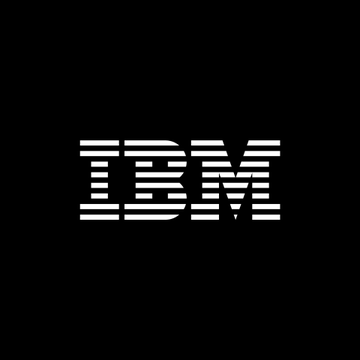The image features the iconic IBM logo in white striped lettering against a solid black background. This relates to the post as it visually represents IBM, the company that has added beta connectivity to Swift's blockchain ledger for tokenized deposit transfers.