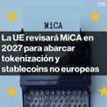 A Spanish-language news headline from MICA reading 'La UE revisará MiCA en 2027 para abarcar tokenización y stablecoins no europeas' with EU and Spanish flag icons.