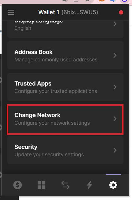 A mobile wallet settings menu displaying options including 'Address Book', 'Trusted Apps', 'Change Network' (highlighted with a red box), and 'Security'.
