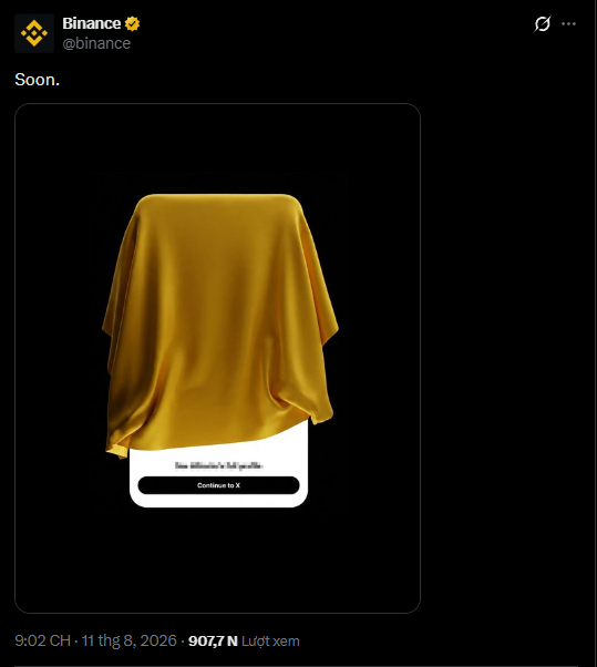 A tweet from Binance (@binance) posted at 9:02 CH on 11 thg 8, 2026, simply says "Soon." and shows an object draped in a yellow cloth with a "Continue to X" button partially visible beneath it, teasing an upcoming announcement that aligns with speculation about a new product launch from CZ.