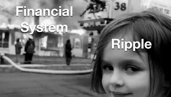 The image is a popular meme format featuring the "Disaster Girl" meme, where a smirking girl is photoshopped in front of a burning building. The burning building is labeled "Financial System," while the girl is labeled "Ripple." 

The meme relates to the post by humorously depicting Ripple as calmly standing by while the traditional financial system burns, suggesting that Ripple and its XRP cryptocurrency could benefit from—or outlast—the disruption caused by the lack of clear crypto regulations like the Clarity Act mentioned in the tweet.