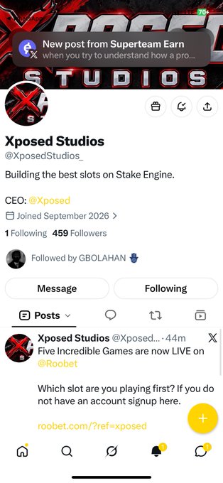 A screenshot of the Xposed Studios Twitter profile, displaying the handle @XposedStudios_, a bio stating 'Building the best slots on Stake Engine.', and a recent tweet linking to RooBet.