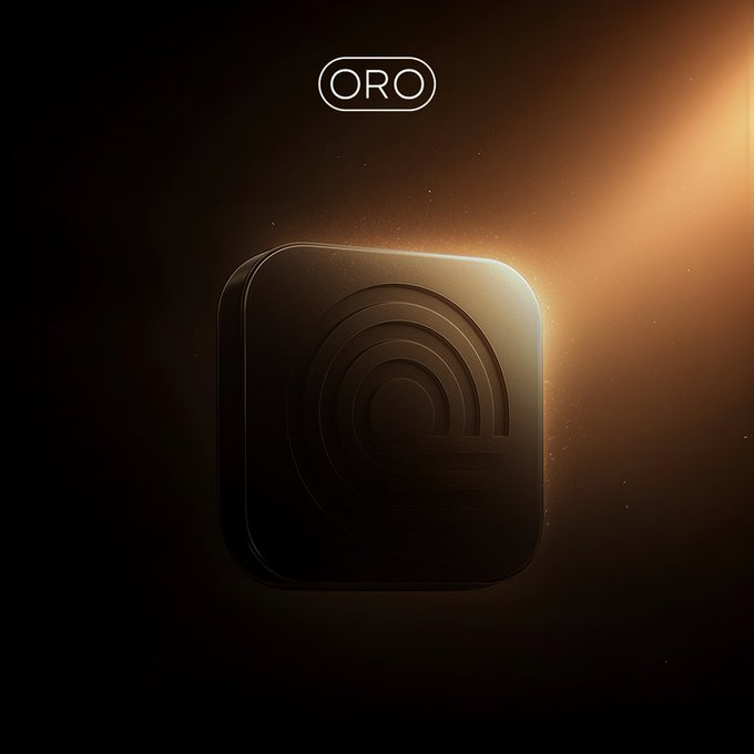 A dark, atmospheric image featuring a black square device with an embossed 'e' logo and the word 'ORO' displayed at the top, illuminated by a warm orange light.