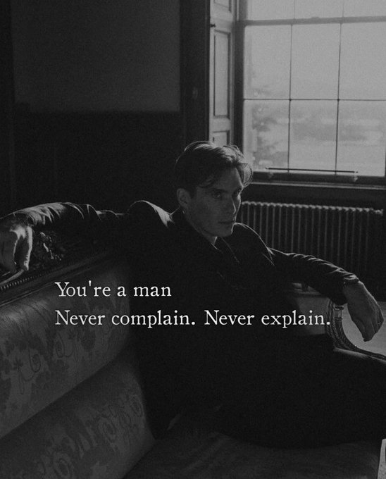 A black-and-white atmospheric portrait of a man on a couch with the overlaid text: 'You're a man. Never complain. Never explain.'