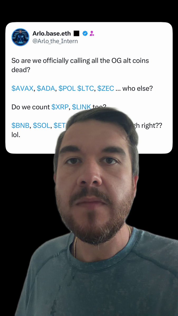 The image features a man with a beard wearing a blue shirt, who appears to be making a funny face for the camera. The caption of the image includes some text that reads "So are we officially calling all the O&G altcoins?". This suggests that there might have been an event or announcement related to cryptocurrency, and the man is reacting humorously to it.
