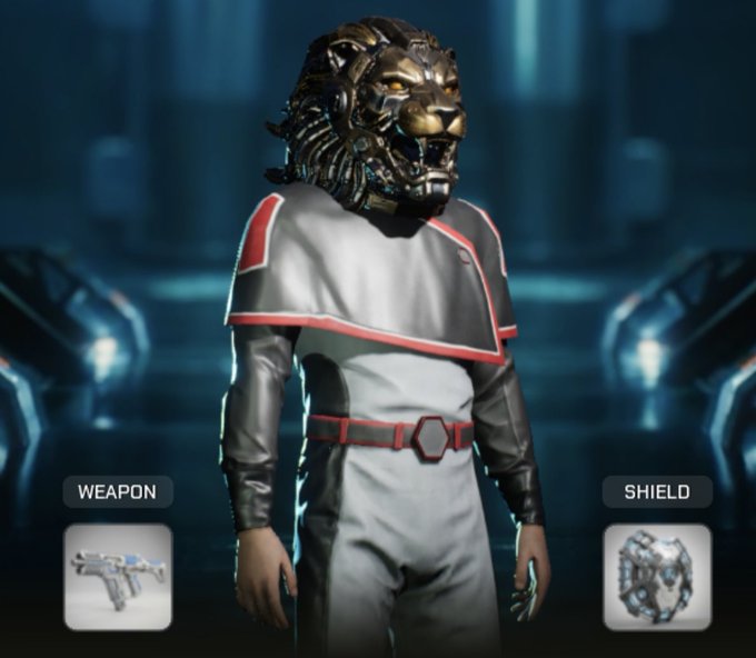 A video game character wears a metallic lion mask and futuristic armor, standing in a dark arena with "WEAPON" and "SHIELD" selection icons displayed.