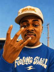 A young man wearing a white 'Feeling Shell' cap and a blue 'Feeling Shell' sweatshirt makes a hand gesture while looking at the camera against a clear blue sky.