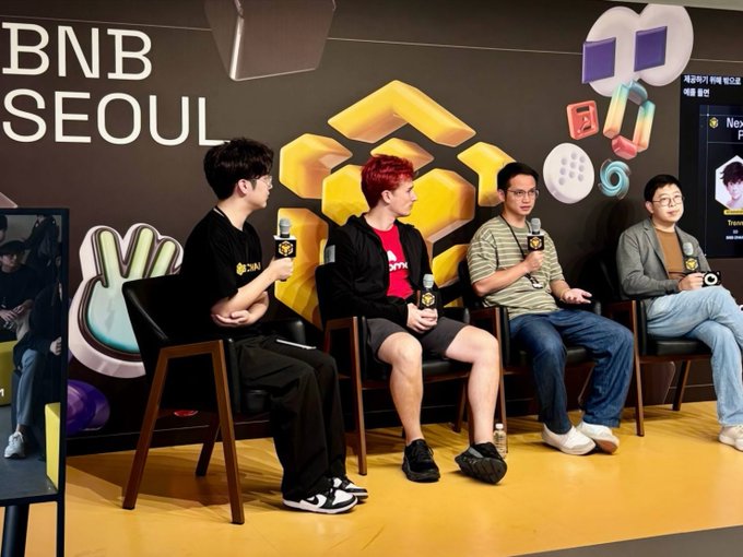 Four men sit on a panel stage at an event labeled "BNB SEOUL," with a BNB Chain logo visible in the background.