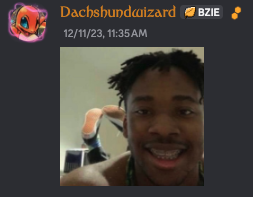 A social media post from 'Dachshundlizard' with BZIE displayed, timestamped 12/11/23, 11:35 AM, showing a person smiling.
