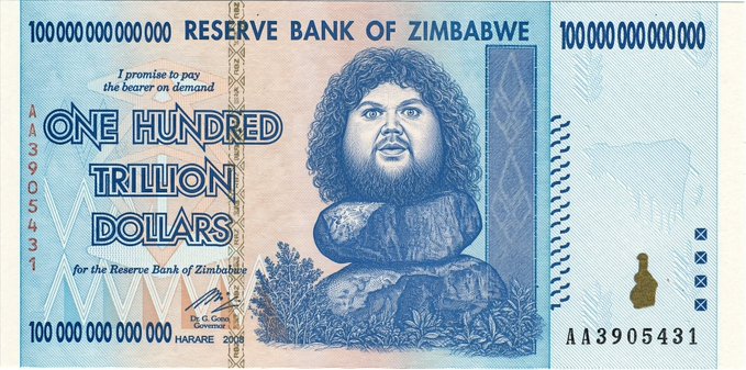 A Zimbabwe one hundred trillion dollar banknote from the Reserve Bank of Zimbabwe, featuring stacked boulders and the serial number AA3905431, highlighting extreme hyperinflation and the absurd purchasing power of such an enormous denomination—tying into the post's joke about why stop at $5,000 when even a hundred trillion barely buys anything.