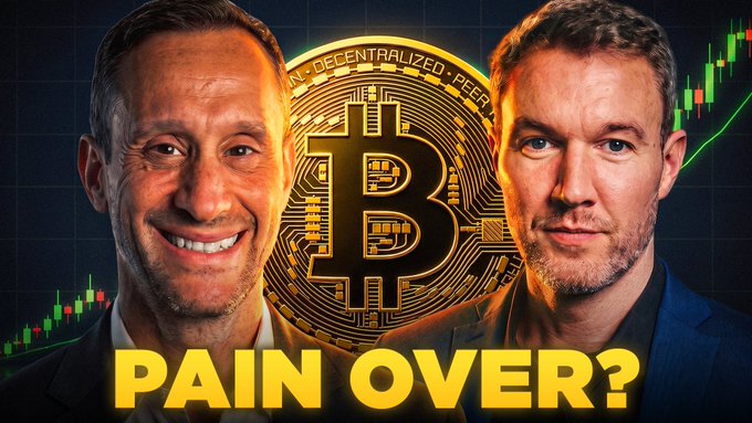 The thumbnail features two men flanking a large Bitcoin logo with the bold yellow text "PAIN OVER?" displayed below, alongside green candlestick charts suggesting a bullish price reversal. This imagery aligns with the post's claim that Bitcoin's extended 11-month correction may finally be ending, promoting a live discussion scheduled for 9 AM EST.