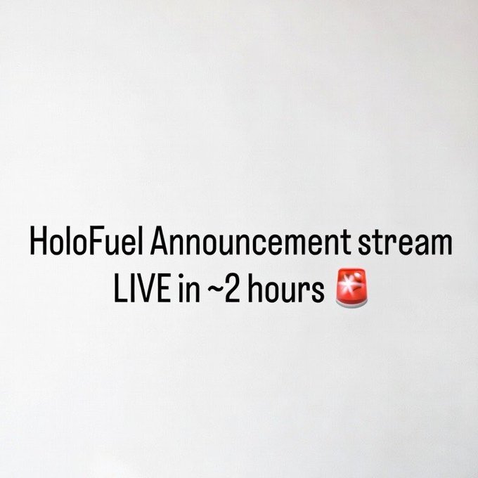 A white screen with black text reading 'HoloFuel Announcement stream LIVE in ~2 hours' accompanied by a siren emoji.