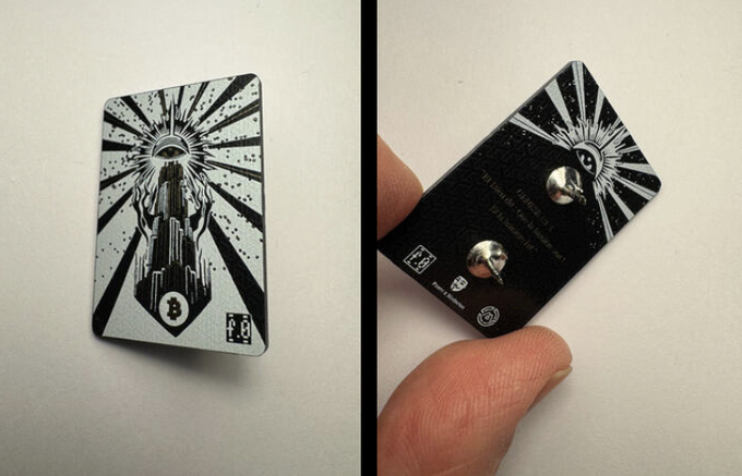 Two views of a black enamel pin featuring a pyramid with an all-seeing eye and "8" symbol, with the reverse showing "DON'T TRUST, VERIFY" and two metal posts.