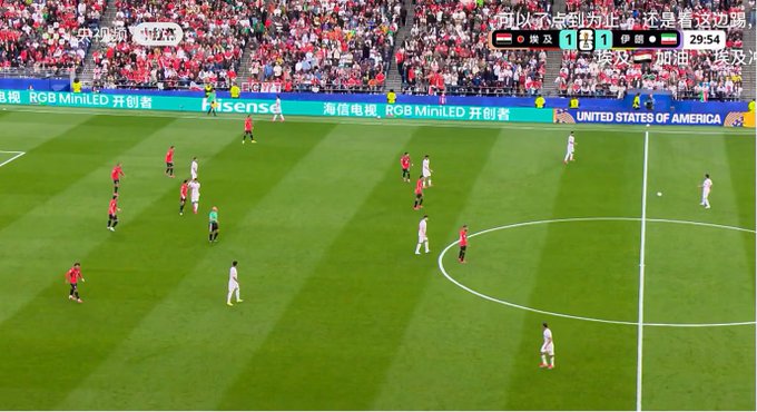 Egypt and Iran are tied 1-1 at 29:54 during their World Cup match at Lincoln Financial Field, with advertising boards displaying Hisense and "ROB MiniLED" branding. The image supports the post's discussion of the Egypt vs Iran game, showing the close score that suggests an exciting match ahead.