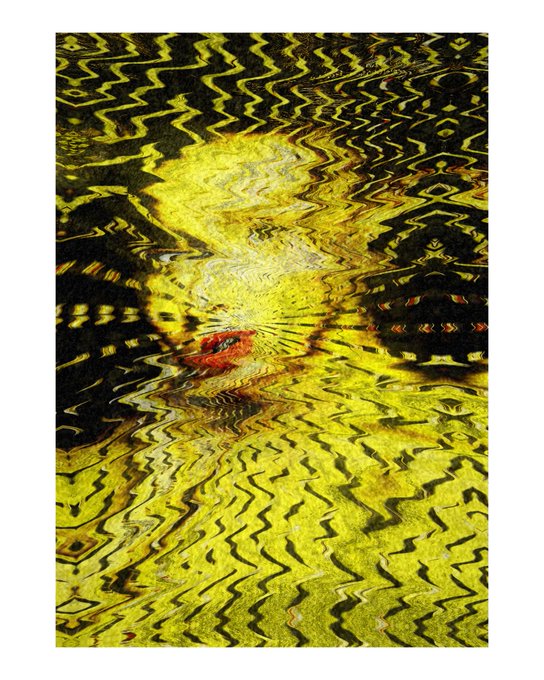 An abstract, textured image featuring wavy, distorted patterns in shades of yellow, black, and brown, resembling rippling water or a digital glitch effect.