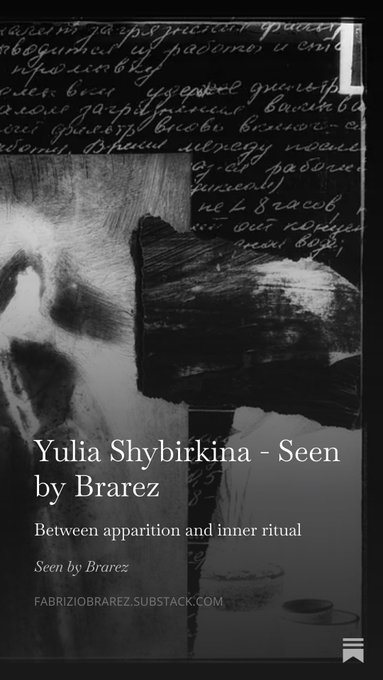 The image features a book cover with a black background, white text, and an illustration of a skull and crossbones symbol. The title "Yulia Shybirka - Seen by Braez" is written above the illustration. The post also mentions that the book has been delayed but will be available soon. A caption below the image reads: 
"I was busy but it's Wednesday. Seen by Braze has delayed its drop but it' s here Today my lens is on the @tezos artist @shybirkina Link in comments".