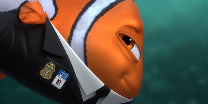 A close-up of Marlin from *Finding Nemo* in a suit with an FBI-style badge and a small photo ID is shown, visually humorously playing on the post's "drop your solana address" request as if demanding wallet credentials like law enforcement.