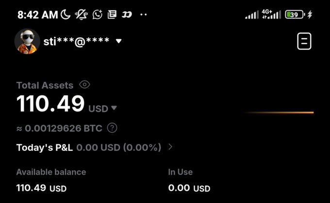 A screenshot of a financial app showing a 'Total Assets' balance of 110.49 USD (approximately 0.00129626 BTC), with 0.00 USD in use and 0.00 USD profit/loss for the day.