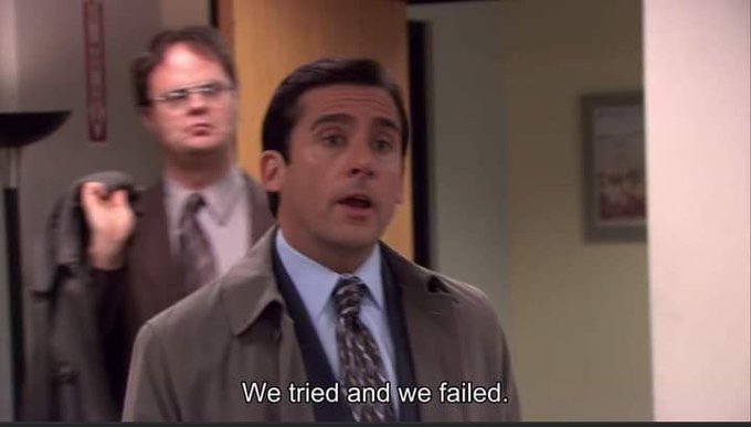 A scene from The Office TV show featuring Michael Scott in the foreground and Dwight Schrute behind him, with subtitles reading 'We tried and we failed.'