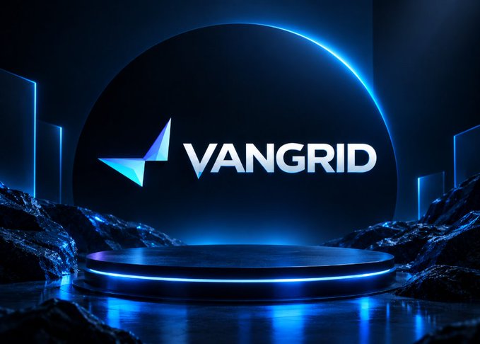 A digital promotional graphic displaying the 'VANGRID' logo with a stylized blue and purple arrow symbol against a dark blue background with a circular light effect and rocky foreground.