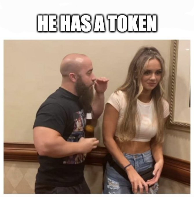 A 'Drunk Baby vs. Sober Dad' meme featuring a bald bearded man drinking a beer next to a young woman, with the caption 'HE HAS A TOKEN'.