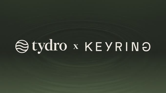 A dark green promotional banner with a water ripple effect announces a collaboration between "tydro" and "KEYRIN∂" in white text.