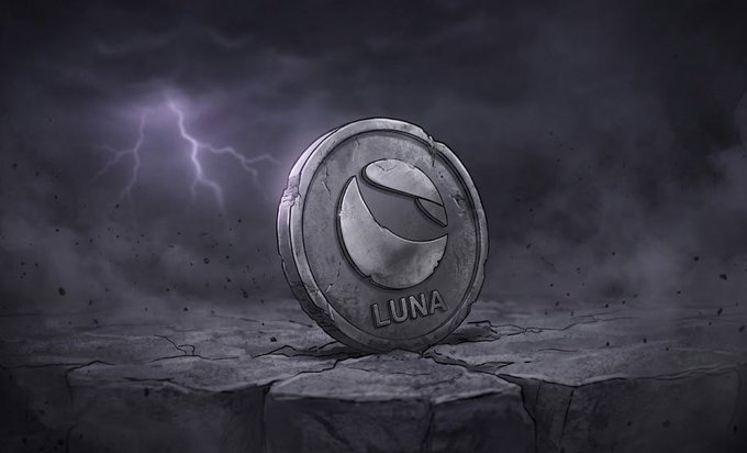 The image features a coin with the word "Luna" written on it, placed on a rock that sits on top of a cliff or mountain. This scene takes place under a stormy sky filled with lightning bolts. The combination of the coin's position atop the rocky terrain and the dramatic backdrop creates an atmospheric and striking visual effect in this image.