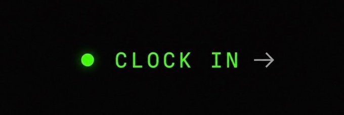 A digital clock-in prompt displaying a green dot, the text 'CLOCK IN', and a right-pointing arrow.