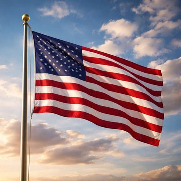 An American flag waves against a partly cloudy sky, symbolizing the United States as consumer confidence dropped sharply to 81.9 in September, falling short of expectations amid growing concerns over prices and jobs.