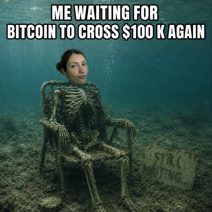 A meme with the text 'ME WAITING FOR BITCOIN TO CROSS $100K AGAIN' shows a woman's face superimposed onto a coral-encrusted skeleton sitting on a chair underwater next to a 'STILL WAITING' sign.