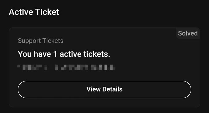 A dark-themed 'Active Ticket' notification box indicating 'You have 1 active tickets.' with a 'Solved' tag and a 'View Details' button.