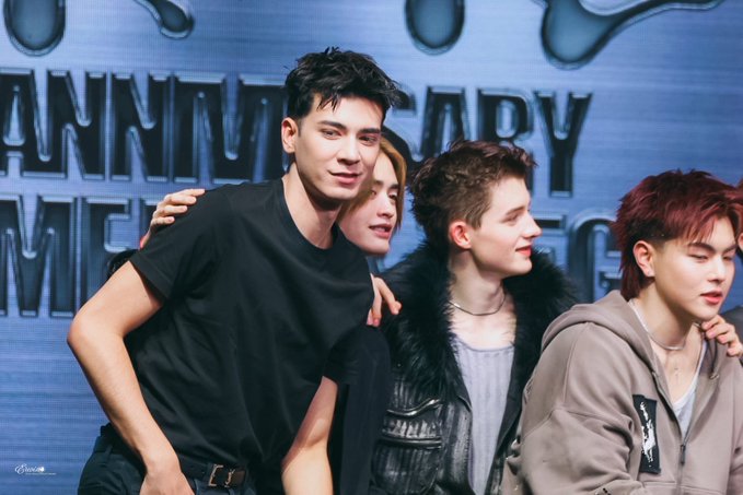 Four young performers pose together at an event, with a backdrop displaying "1ST ANNIVERSARY" text, celebrating CIRCRL's first anniversary alongside Erwin and the ATLAS group from Thailand.