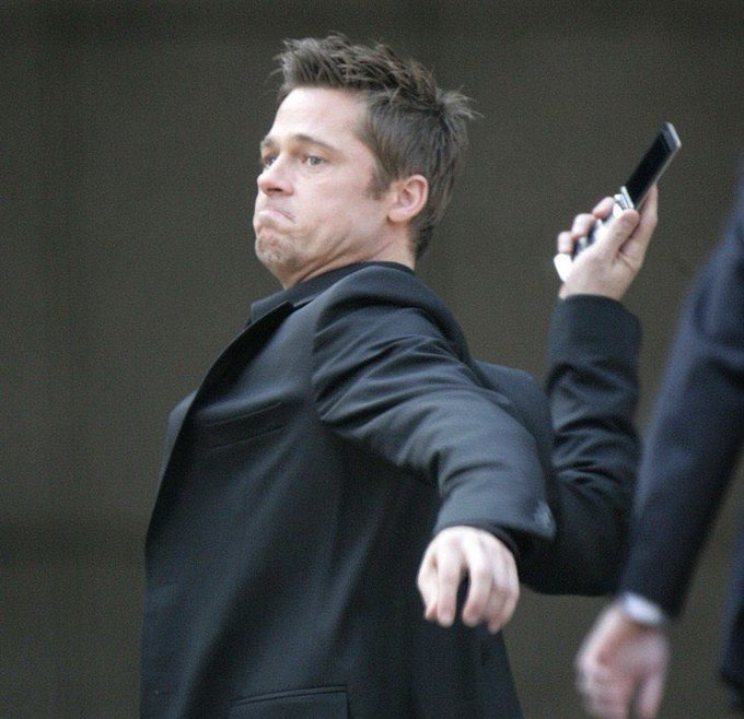 The image features a man dressed in a suit with his arm outstretched, holding a cell phone up to his ear as if he's talking or listening to something. The background of the photo shows a person wearing a black suit standing behind him. There is also another person partially visible on the right side of the frame who appears to be looking at the man in the suit with the cell phone.

The image seems to be related to a post that says "$AVAX flipped by $SUI that can’t even go one week without the network stopping". This suggests that there might have been an incident or some sort of disruption involving the cell phone, possibly due to a technical issue or unauthorized access. The man in the suit could be involved in investigating or addressing this situation.