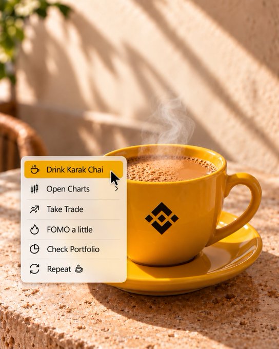 A steaming yellow Binance chai cup sits on a textured surface, overlaid with a menu of crypto trading actions like "Open Charts," "Take Trade," and "FOMO a little"—humorously portraying the day's trading routine as a beverage ritual that pairs perfectly with the post urging everyone to get on Binance.