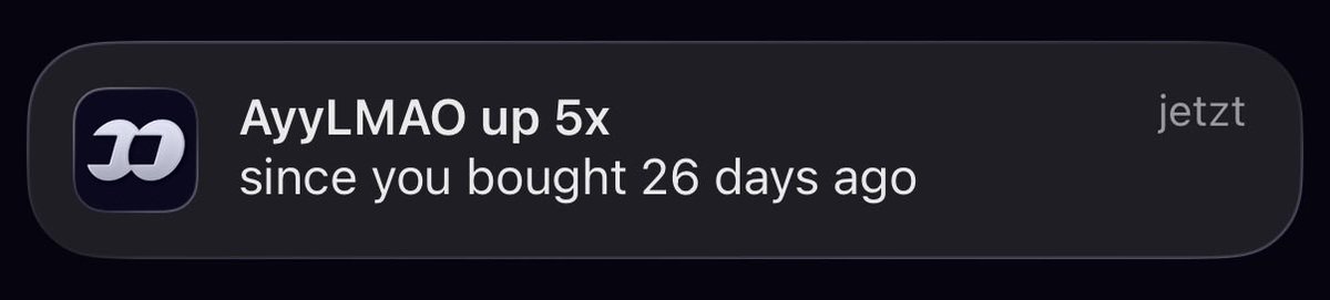 A notification from a crypto wallet app displaying "AyyLMAO up 5x since you bought 26 days ago" with a "jetzt" (German for "now") button, illustrating the post's message about how holding onto lesser-known tokens like AyyLMAO can yield significant gains without needing insider knowledge or large capital.