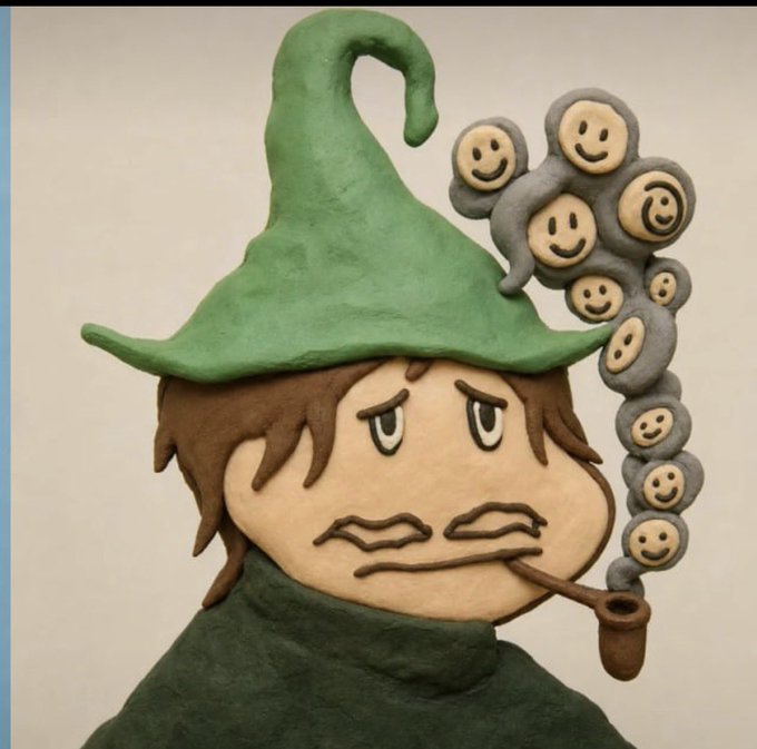 A claymation-style wizard figure wearing a green pointed hat and smoking a pipe, with a trail of smiling face smoke bubbles rising beside his head, appears to depict a playful, magical NFT character tease referenced in the post about @0xClayFactory.