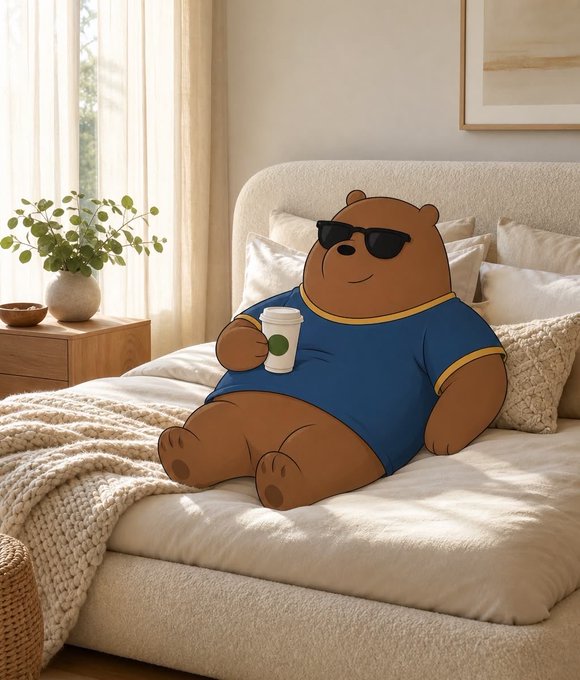 An illustrated brown bear wearing sunglasses and a blue t-shirt, sitting on a bed holding a coffee cup, in a cozy bedroom setting with a potted plant.