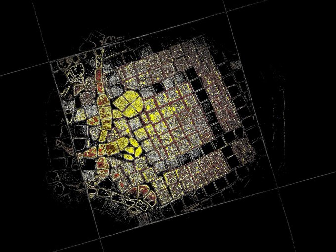 Abstract digital artwork showing a textured, grid-like pattern with a yellow hand or fist design overlaid on a dark background.