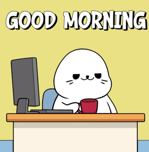 A cartoon "GOOD MORNING" illustration featuring a cute white seal-like character sitting at a desk with a computer monitor and holding a red mug