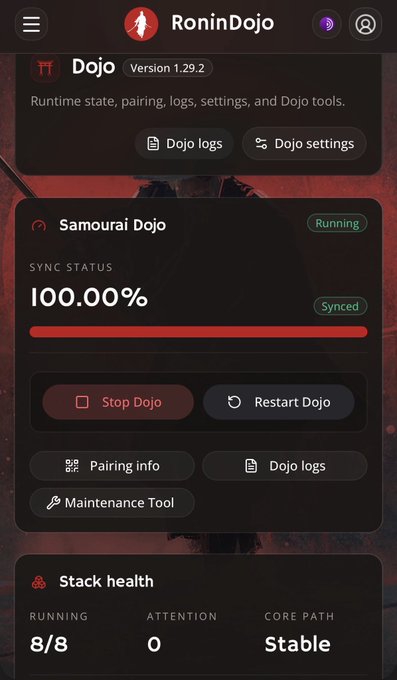 A RoninDojo app interface for Samourai Dojo Version 1.29.2 shows sync status at 100.00% synced, stack health running 8/8, with options to stop, restart, view pairing info, and check Dojo logs.