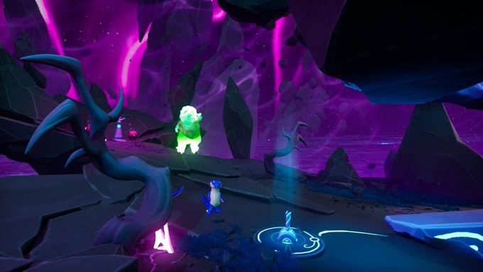 A blue ape character stands in a vibrant, otherworldly cave illuminated by glowing pink and purple energy, with a green ghostly figure floating nearby—capturing the immersive gaming atmosphere of the OthersideMeta event mentioned in the post.