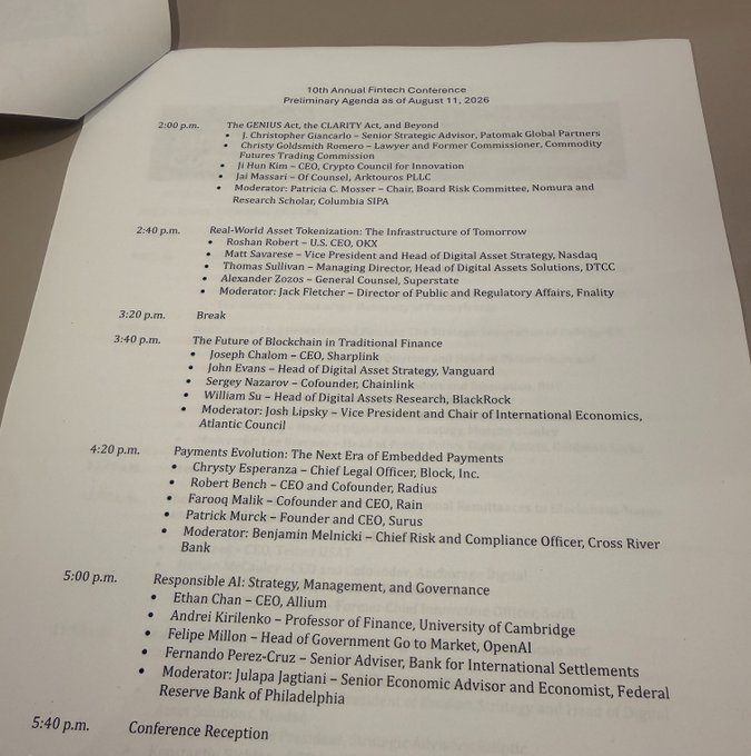 Printed agenda for the 10th Annual Fintech Conference Preliminary Agenda as of August 11, 2026, listing sessions on tokenization, blockchain, payments evolution, and responsible AI with speakers from Vanguard, BlackRock, Chainlink, and OpenAI.