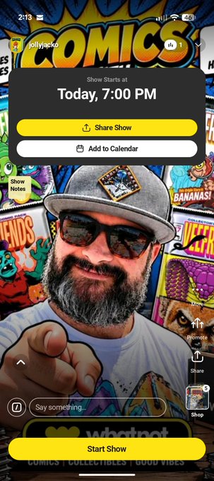 A mobile screenshot of a live show titled "COMICS" by jollyjacko, scheduled for Today, 7:00 PM, featuring a bearded man in a cap and sunglasses pointing at the camera.