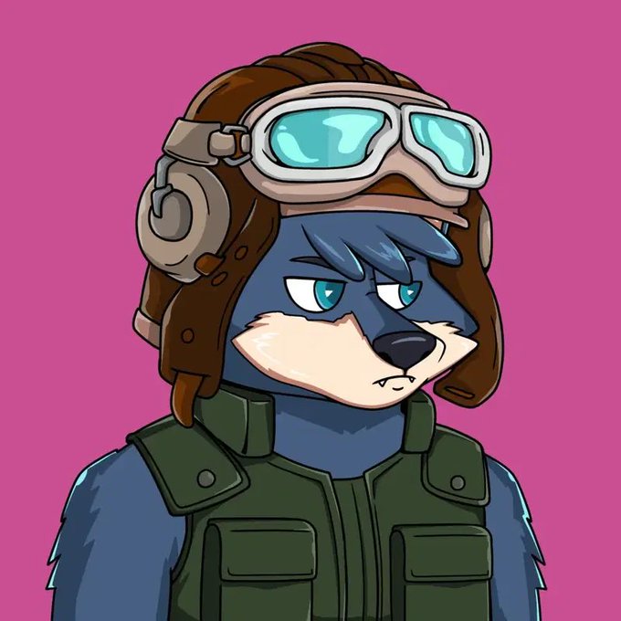 A cartoon/anthropomorphic blue wolf character wearing an aviator hat with goggles pushed up, dressed in a green military-style vest, set against a bright pink background.