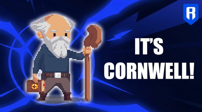 A pixel art character of a bearded old man holding a staff and a briefcase stands against a blue background with the bold text 'IT'S CORNWELL!'.